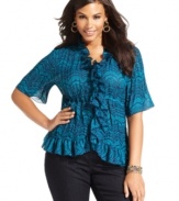 Frill up your casual wear with NY Collection's short sleeve plus size blouse, accented by ruffled trim.