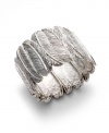 Prepare for blustery weather in this chic, autumnal cuff. Style&co.'s trendy stretch bracelet features a textured leaf pattern in silver tone mixed metal. Bracelet stretches to fit wrist. Approximate diameter: 2 inches.