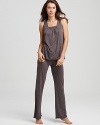 Get swept away in comfort and style with this satin-trimmed pajama set from Carole Hochman.