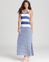 Bold stripes bring an effortlessly cool nautical feel to this balmy-season maxi dress. Pair the look with sky-high platforms for next-level chic.