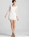 Classically chic, this cream lace French Connection dress embodies the ladylike trend in the chicest of style, flaunting sheer sleeves and a scallop hem for a touch of femme.