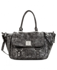 Add lady-like polish to your everyday ensemble with this irresistible satchel silhouette from Nine West. Dressed up in shiny, silver-tone hardware, buckle details and stud accents, it makes an easy transition from deskside to dinner date.