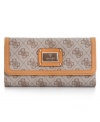 With signature quatrefois G monogram print punctuated with polished silver-tone hardware, this GUESS design is slender enough to slip into a bag and eye-catching enough to carry as a clutch. Plenty of card slots, pockets, and zipped compartment offer exceptional organization within.