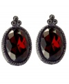 Antique allure. Vintage inspiration defines T Tahari's Crystal Elegance Collection faceted ruby crystal button clip on earrings. Accented by glittering black crystals, they're crafted in hematite tone mixed metal and nickel free for sensitive skin. Approximate size: 1-1/2 inches x 3/4 inch.