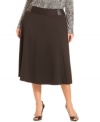 Feminize your work wardrobe with Jones New York Signature's plus size skirt, defined by an A-line silhouette.