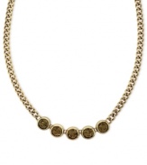 Subtle chic. Jessica Simpson's frontal necklace, crafted from gold-tone mixed metal, features a row of glass light topaz stones for a stylishly understated approach. Approximate length: 16 inches.