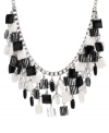 Glam geometrics. Haskell's chic cluster necklace features rows of black and white square beads and pinstriped beads strung together. Setting and box chain crafted in silver tone mixed metal. Approximate length: 18 inches + 3-inch extender. Approximate drop: 2-6/10 inches.