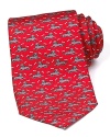 Crafted in luxuriously soft silk, this handsome tie from Vineyard Vines is adorned with a vivid dog pattern.