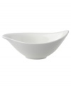 Fresh modern from Villeroy & Boch dinnerware. This dip or salad bowl is made of sheer white china in leaf form that inspires naturally harmonious dining. A soft fluidity and radiant glaze give it quiet elegance and lasting appeal.