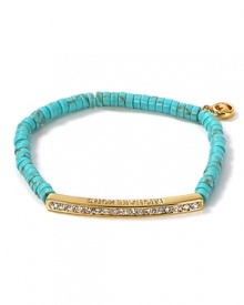 Work Southwestern flair into your accessory collection with MICHAEL Michael Kors' turquoise bracelet. Wear the the Santa Fe-inspired style day and night--it loves denim and LBDs.