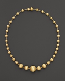 Gorgeously textured beads of 18K yellow gold gleam richly on this necklace from the Africa Collection.