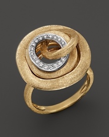 Diamonds in a hand-engraved 18K gold ring from the Marco Bicego Jaipur collection.