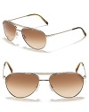 Iconic aviator sunglasses get an update with a smaller frame and thick top bar accent.