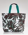 Take your penchant for prints seaside with this canvas tote from DIANE von FURSTENBERG. Sized to stow your sun bathing essentials, it's a beach babe's must.