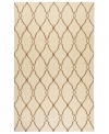 Stunning in its simplicity, this artist-designed area rug from Surya brings a calming beauty to any area in your home. Interlocking lines crisscross against a soft ivory background, creating a chic lattice-like pattern that's stylishly simple.