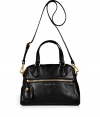 Detailed in textural black leather with a practical crossbody strap, Marc by Marc Jacobs convertible tote lends a cool Downtown edge to every outfit - Zippered front pocket with luggage tag, metallic embossed logo, double top handles, removable belted shoulder strap, zippered top, inside zippered back wall pocket, 2 front wall slot pockets - Sling across for work, school, or weekend shopping