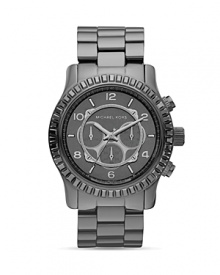 With an oversized bezel and crystal finish, MICHAEL Michael Kors' watch is big on modern polish. Wear the smoky-toned ticker with a sleek frock and confident attitude.