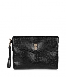 Show your tablet a little love with this sleek and sophisticated black case from Marc by Marc Jacobs - Allover ostrich embossed detail - Envelope clutch style with removable wristlet - Front flap with gold-tone turnlock closure - Fully lined, graphic print interior - Ultra-durable PVC material protects against dust, scratches and moisture  - Ideal for work, play or anytime youre on the go