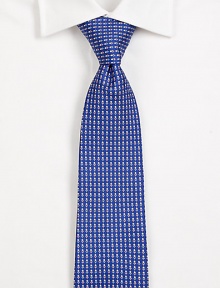 A lively addition to any work wardrobe, handsomely woven in golf-printed Italian silk.SilkDry cleanMade in Italy