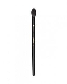 This versatile, long-haired brush gradually tapers to a medium-size dome of soft, natural hair bristles. Its unique shape makes it ideal for applying shadow all over lids, softening eye contour colors, diffusing shadow pigments or setting concealer to perfection. Shadow is seamlessly blended with horizontal strokes from the outer corner of lid up into the crease, making eyes look extra defined. Concealer is set by using light vertical strokes around the eye area.