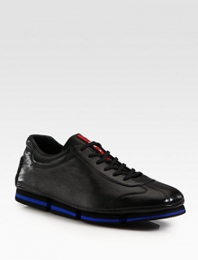 Sleek and sporty lace-up design rendered in Italian calfkskin leather.Leather upperPadded insoleRubber soleImported