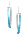 Stir up a style frenzy in chic swag earrings by Haskell. Silver and turquoise-colored chains combine for a statement-making effect. Crafted in silver tone mixed metal with a small crystal accent. Approximate drop: 4-1/10 inches.