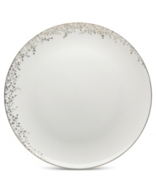 Fringed with shimmering leaves of platinum and mica, these bone china dinner plates from Mikasa turns your table into a springtime utopia. Its sleek coupe shape is a vision of modern elegance in platinum-banded white.