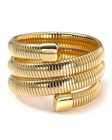 Introduce slinky chic into your jewel box with MICHAEL Michael Kors' golden wrap bracelet. Worn solo, this serpentine cuff makes an impact.