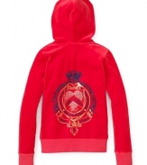 Add a fashion-conscious kick to comfort with a classic hoodie from Juicy featuring a sparkling rhinestone logo detail and the JC signature crown.