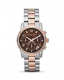 A rich, chocolate hued mother of pearl dial is chicly contrast with a two-tone strap in this modern timepiece from MICHAEL Michael Kors.