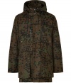 A stylish essential for transitional weather, this camouflage-covered parka will keep you looking cool from season-to-season - Stand-up collar with snaps, hood with adjustable drawstring, concealed zip front closure, long sleeves, cargo pockets, allover camo print - Loosely fitted - Wear with a cashmere pullover, straight leg jeans, and suede ankle boots