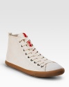 Leather high-top sneakers with logo detail. Shaft, 3½ Leg circumference, 9½ Leather lining Rubber sole Padded insole Imported 