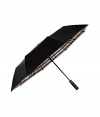 Iconic and essential, Burberry Londons characteristic check umbrella will keep your look in line on even the dreariest of days - Automatic folding feature - Carry with a tailored trench and chic rubber rain boots