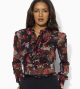 This airy blouse from Lauren by Ralph Lauren is designed in sheer crinkled georgette with romantic ruffles and bright florals for an elegant modern look.