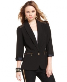 Built tough with exposed zippers and studded shoulder armor, this blazer from Urban Hearts takes layering to the chicest level!