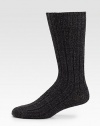 Sumptuous wool blend socks are a perfect choice to wear under your winter boots for all day comfort.Mid-calf height68% wool/30% polyamide/2% elastaneMachine washImported