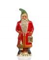 Santa Claus hold a miniature version of himself in this whimsical figurine from Vaillancourt. Hand-painted and shaped from a vintage chocolate mold for one-of-a-kind character.