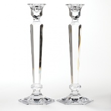 Light up every day of your life with the remarkable beauty of Miller Rogaska crystal. Handcrafted by European artisans with time-honored care and attention to detail, each piece is known for its brilliance, clarity and flawless quality. Summit candlesticks, 12H. pair.