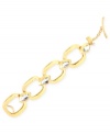 Cool and connected. Robert Lee Morris' bracelet is crafted from gold-tone mixed metal with hammered links adorned with faceted glass stones for a dazzling display. Approximate length: 7-1/2 inches.