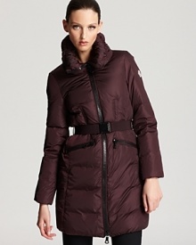 In rich wine or classic black, this standout Moncler coat is flattering with a belted waist. Chunky zippers add a contemporary touch.