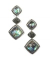 The intriguing iridescent hues of Judith Jack's abalone sheet glass linear drop earrings are enhanced by the brand's signature sparkling marcasite accents (3-1/2 ct. t.w.). Set in sterling silver. Approximate drop: 2-1/10 inches.