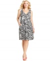 Tie up a delightful casual look with Style&co.'s sleeveless plus size dress, accented by a knotted front.