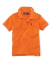 A short-sleeved polo shirt is cut in soft breathable cotton mesh.