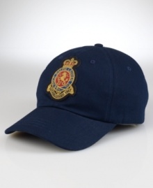 A classic baseball cap in durable washed cotton twill features a signature embroidered crown-and-crest patch for authentic naval styling.