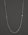 Green fluorite is punctuated by a sparkling topaz bead in this striking necklace from Anzie.