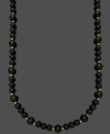 Bold beads create a standout look. A simple strand of polished onyx beads (8-10 mm) mixed with 14k gold accent beads and clasp make for a timeless look. Approximate length: 18 inches.