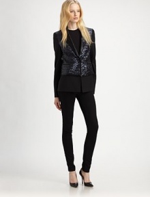 This crisply tailored blazer is embellished with shimmering sequined front and back panels.Velvet lapelsFront button closureWelt pocketsSequined overlay panelFully linedAbout 26 from shoulder to hemShell: polyesterBody: 48% polyester/48% viscose/4% spandexDry cleanImportedModel shown is 5'10 (177cm) wearing US size 4. 