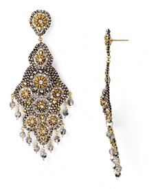 Delicate and dramatic. Michael Ases' beaded chandelier earrings are fabulously festive, at their best paired with a bold lip and glamourous attitude.