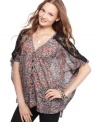 Sugar & Spice's printed top is ultra-thin with a casual fit. Pair with your fave pair of jeggings for a relaxed look.