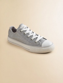 A traditional All Star, lace-up design with Chuck Taylor insole and rubber sole, crafted in shimmery cotton.Lace-upCotton upperTextile liningRubber soleTraditional chuck insoleImported